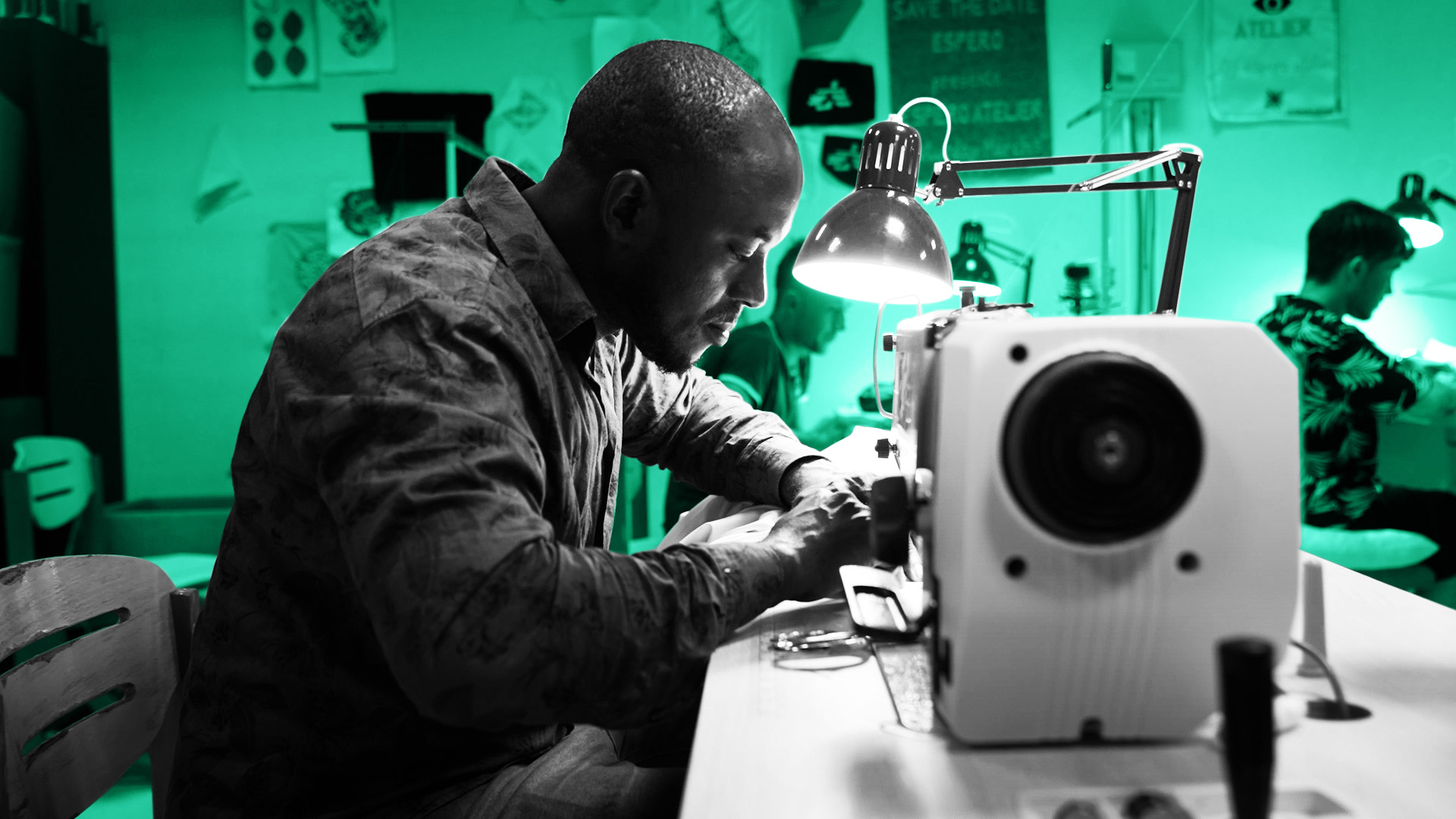 Refugees learning how to sew near Paris
